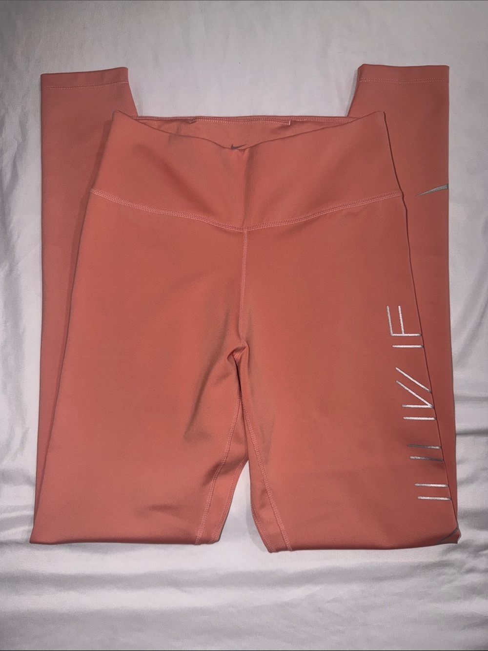 Women’s Nike Coral Dri-FIT Leggings with Subtle Logo